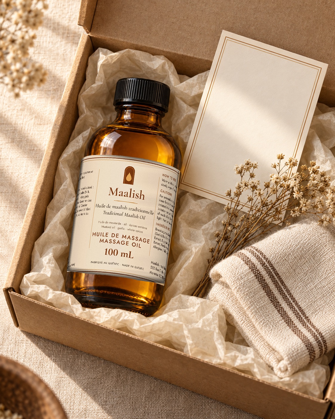 Colis Maalish ouvert : la bouteille dans du papier de soie / Open Maalish parcel with the bottle in tissue paper